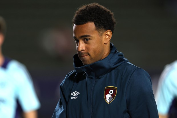 AFC Bournemouth midfielder Tyler Adams walks off the field after...