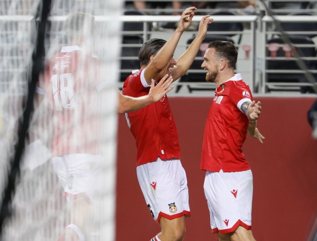 Wrexham AFC's Jack Marriott (11) celebrates his goal against Chelsea...