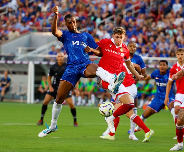 Chelsea FC's Tosin Adarabioyo (4) against Wrexham AFC's Lewis Brunt...