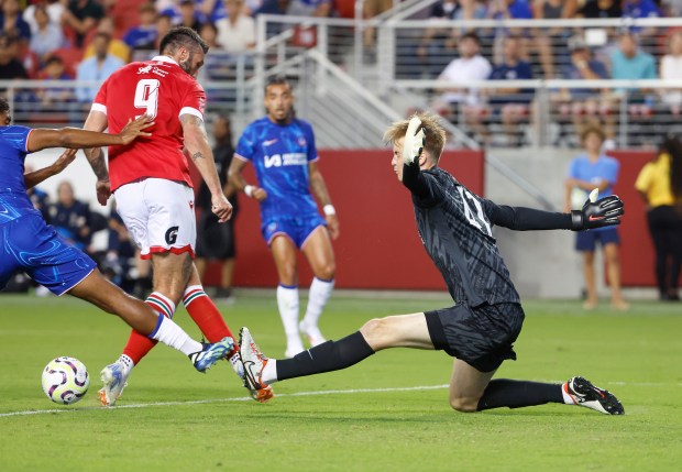 Chelsea FC goalkeeper Lucas Bergstrom (47) fights for the ball...