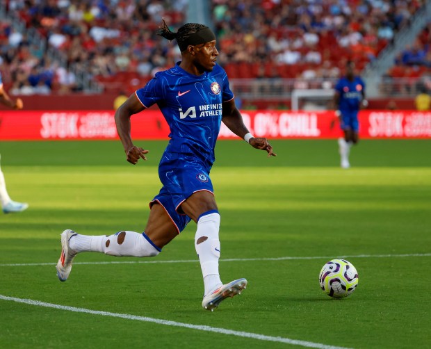 Chelsea FC's Noni Madueke (11) controls the ball against Wrexham...