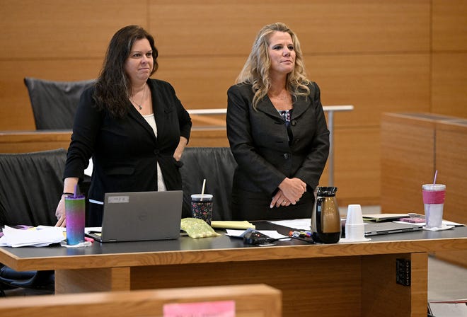 Assistant State Attorneys Rebecca Freel and Suzanne O’Donnell stand as potential jurors file in for the voir dire portion of Ashely Benefield’s trial for the second-degree murder of her estranged husband in 2020 at the Manatee County Judicial Center, July 22, 2024.