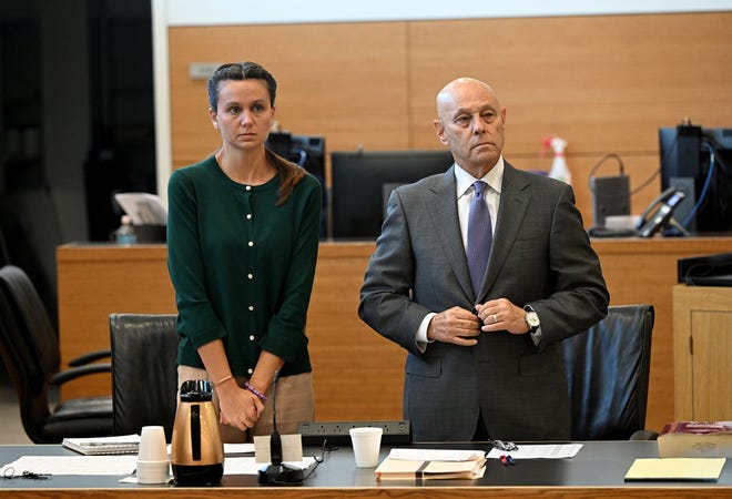 Ashley Benefield and her attorney Neil Taylor stand before potential jurors in the voir dire portion of her trial for the second-degree murder of her estranged husband in 2020 at the Manatee County Judicial Center, July 22, 2024.