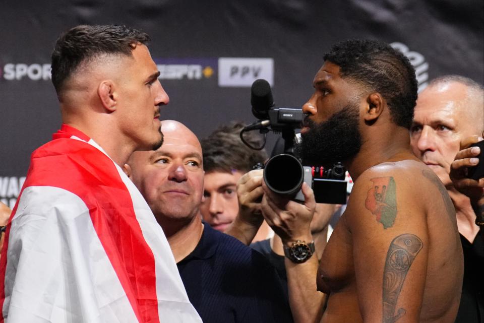 Tom Aspinall (left) will defend the interim heavyweight title against Curtis Blaydes (Zuffa LLC via Getty Images)