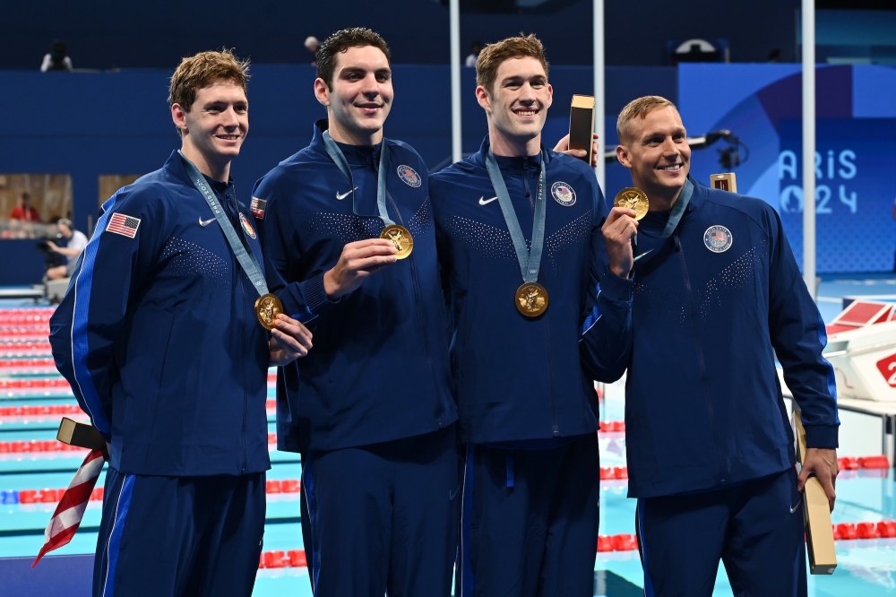 Gold medalists Chris Guiliano, Jack Alexy, Hunter Armstrong and Caeleb Dressel of Team USA.