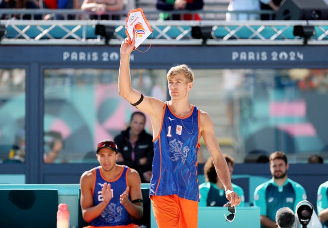 Steven van de Velde of Team Netherlands reacts during the Men's Preliminary Phase - Pool B match between Team Netherlands and Team Italy during the Paris Olympics.