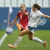 Canada's Adriana Leon, left, and New Zealand's Mackenzie Barry fight for the ball during the women's Group A soccer match between Canada and New Zealand at Geoffroy-Guichard stadium during the 2024 Summer Olympics, Thursday, in Saint-Etienne, France.