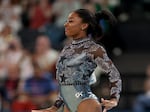 Simone Biles performed the floor exercise on Sunday with her ankle and calf taped. 