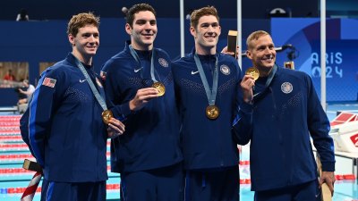 Gold medalists Chris Guiliano, Jack Alexy, Hunter Armstrong and Caeleb Dressel of Team USA.