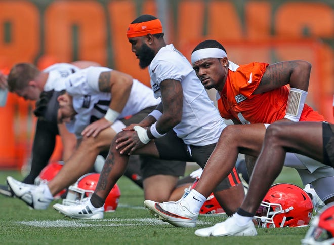 Cleveland quarterback Deshaun Watson stretches with the team during the Browns' June minicamp.