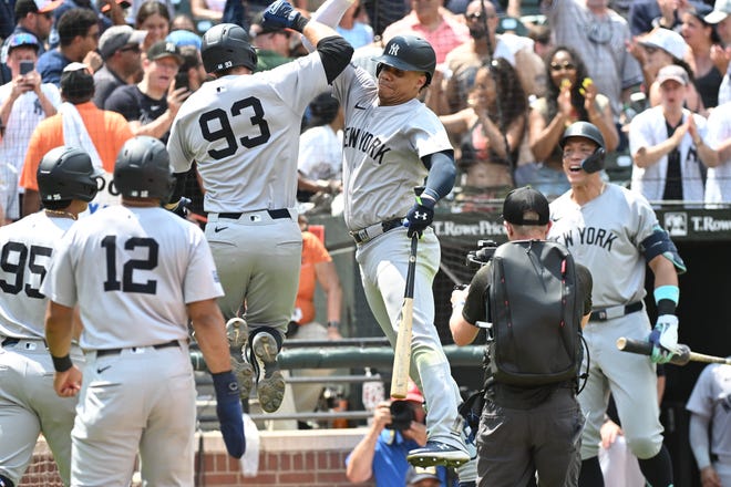 Jul 14, 2024; Baltimore, Maryland, USA; New York Yankees first baseman Ben Rice (93) and outfielder Juan Soto (22) celebrate a home run during the ninth inning against the Baltimore Orioles at Oriole Park at Camden Yards. Mandatory Credit: James A. Pittman-USA TODAY Sports