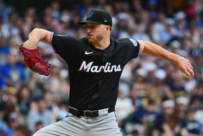 Jul 26, 2024; Milwaukee, Wisconsin, USA; Miami Marlins starting pitcher Trevor Rogers (28) pitches in the first inning against the Milwaukee Brewers at American Family Field. Mandatory Credit: Benny Sieu-USA TODAY Sports