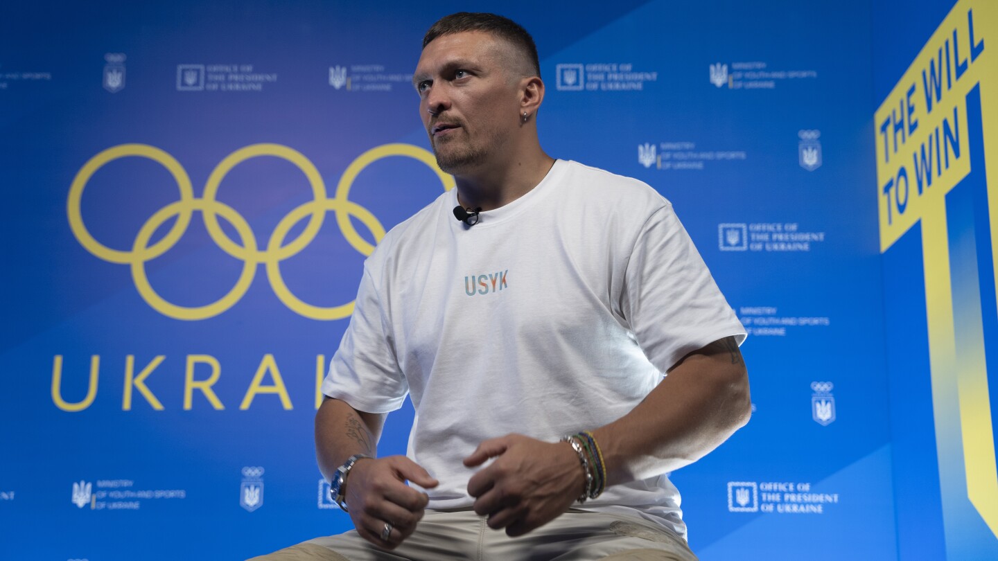 Boxing champion Oleksandr Usyk comes to Paris to support Ukrainian athletes at Olympics