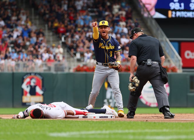 Brewers third baseman Joey Ortiz reacts after tagging out Twins shortstop Willi Castro, who was trying to leg out a triple during the first inning Sunday at Target Field in Minneapolis.