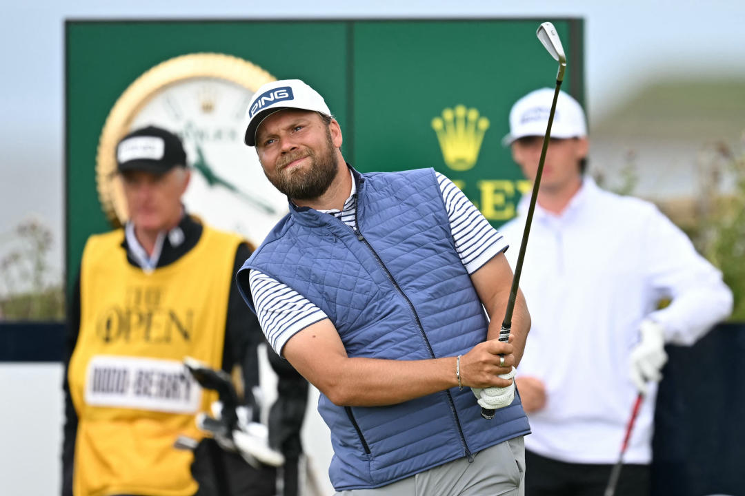 England's Daniel Brown watches his iron shot from the 2nd tee during his second round, on day two of the 152nd British Open Golf Championship at Royal Troon on the south west coast of Scotland on July 19, 2024. (Photo by Paul ELLIS / AFP) / RESTRICTED TO EDITORIAL USE (Photo by PAUL ELLIS/AFP via Getty Images)