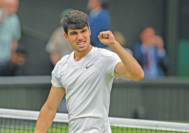 Carlos Alcaraz beats Frances Tiafoe at Wimbledon in five-set escape