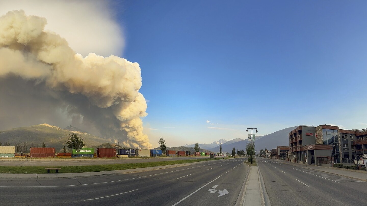 Fast-moving wildfire in the Canadian Rockies hits the town of Jasper