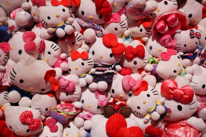 A photograph taken on January 24, 2024 shows a Hello Kitty installation during a photocall of the exhibition