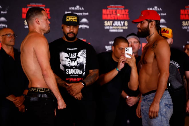 Nate Diaz (left) and Jorge Masvidal during Friday's weigh-in ahead of Saturday's match in Anaheim, California.