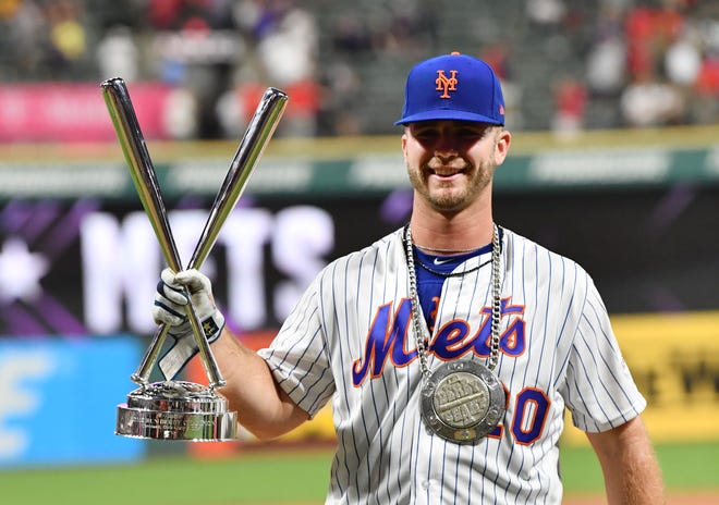 Pete Alonso of the Mets celebrates winning his first of two Home Run Derby titles in 2019. Alonso returns for this fifth consecutive Derby on Monday night.