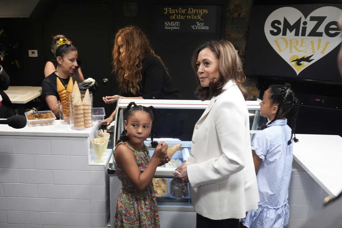 Vice President Harris and her grand-nieces get ice cream from a shop owned by Tyra Banks, center left, in Washington, on July 19.