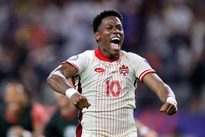 Canada's Jonathan David celebrates Friday night's win over Venezuela in the quarterfinals of the 2024 Copa America tournament.