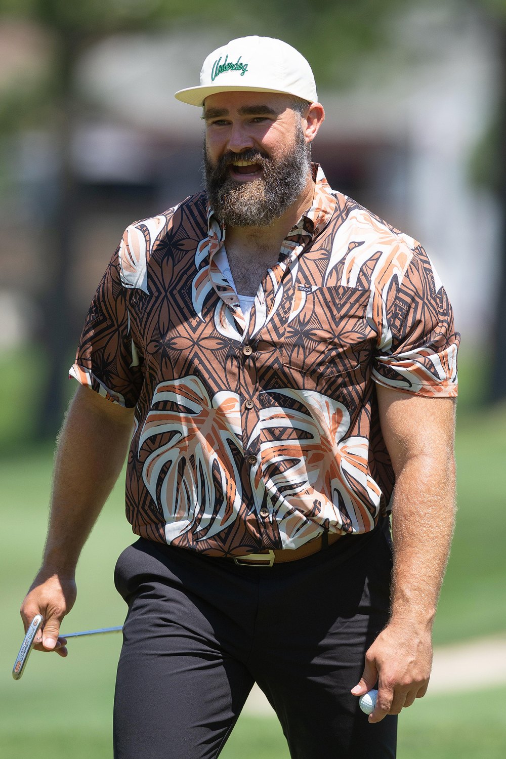 Jason Kelce Autographs Crying Baby's Onesie in the Middle of Charity Golf Tournament