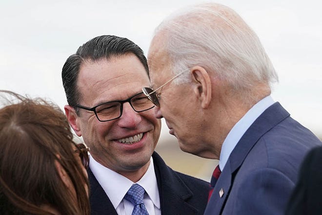 U.S. President Joe Biden is greeted by Governor Josh Shapiro upon arrival in Philadelphia, Pennsylvania, U.S. on December 11, 2023.