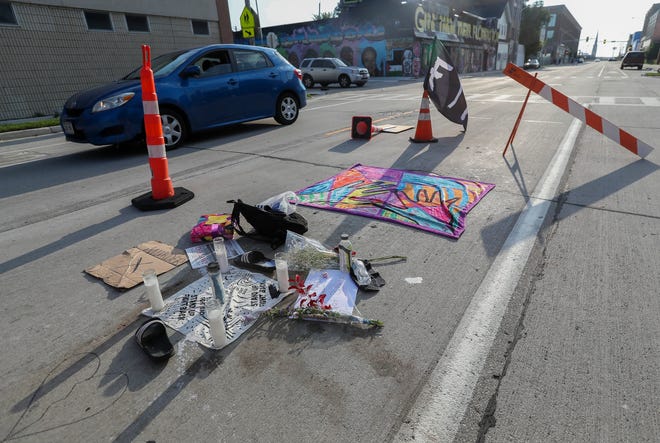 A memorial for Samuel Sharpe Jr. near at the scene of an officer-involved shooting on July 17, 2024, near the intersection of North 14th Street and West Vliet Street in Milwaukee.