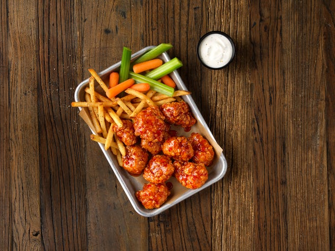 With a $10 online order at Buffalo Wild Wings on Monday, July 29, you get a voucher for six free wings free with the purchase of any burger on your next visit.