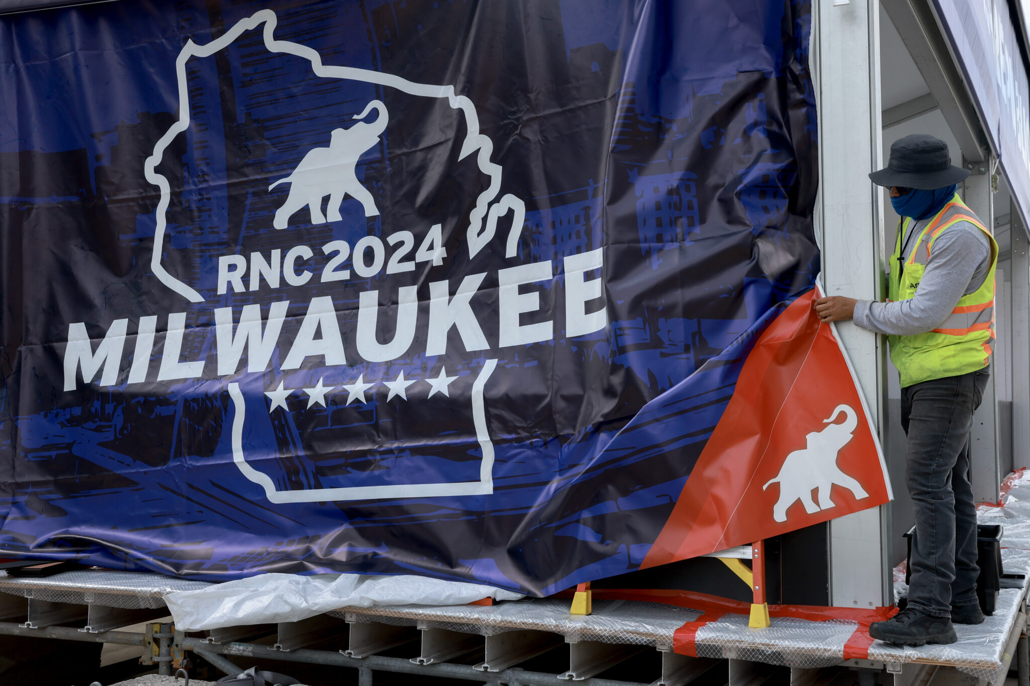 A worker helps prepare the Fiserv Forum for the start of the Republican National Convention on July 11, 2024 in Milwaukee, Wisconsin