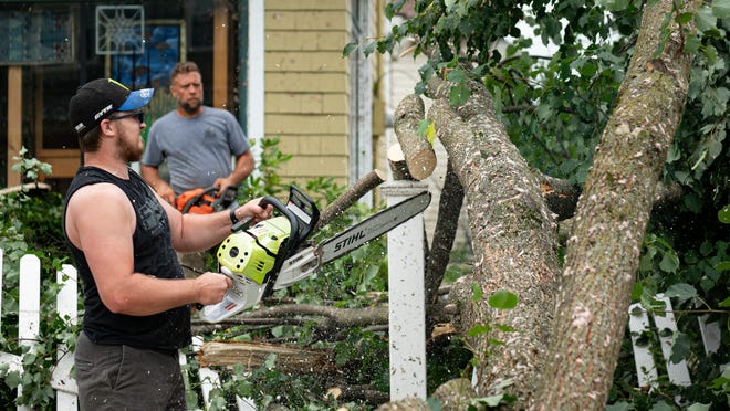 Residents begin cleanup with state help