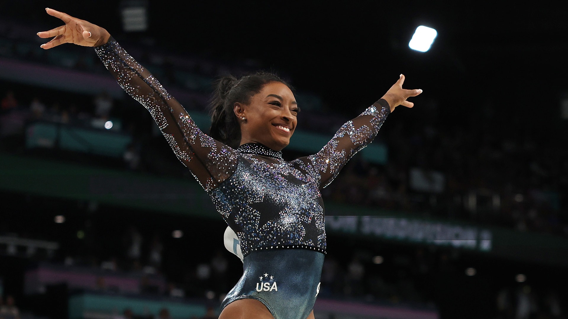 Simone Biles' gritty performance helps U.S. take lead during Olympic qualifications