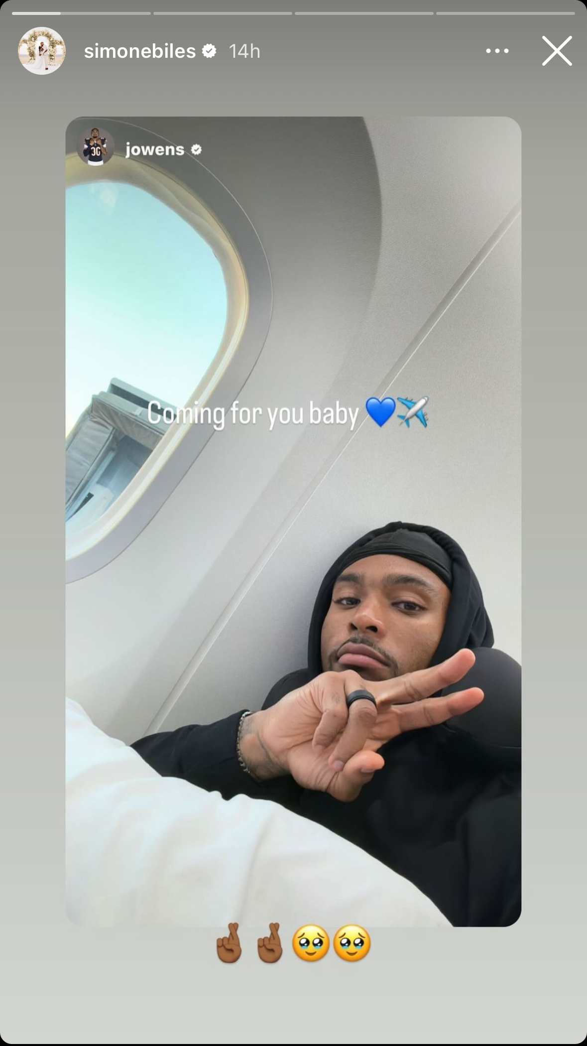 Simone Biles's husband Jonathan Owens takes a selfie inside a plane.