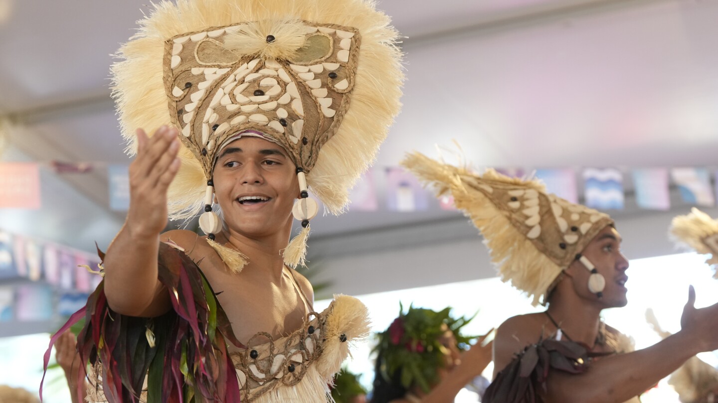 Singing, ceremonies and straw hats: Olympics opening ceremony in Tahiti centers Polynesian culture