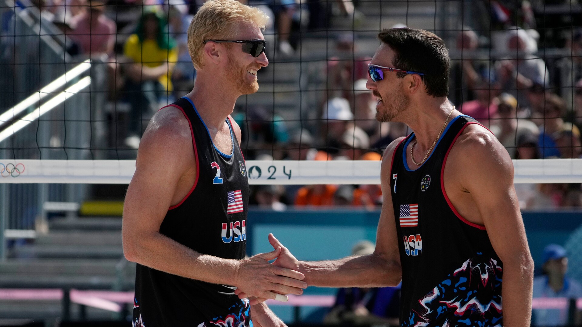 USA's Chase Budinger, Miles Evans run over France in Paris beach volleyball opener