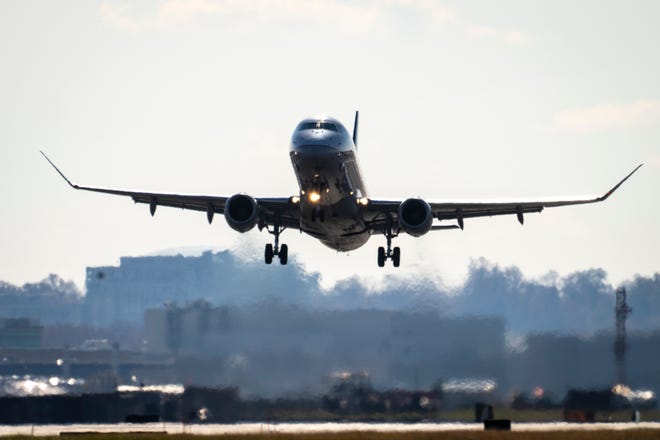 A United Airlines plane takes off from Ronald Reagan Washington National Airport in Arlington, Virginia in this file photo from Nov. 23, 2021.