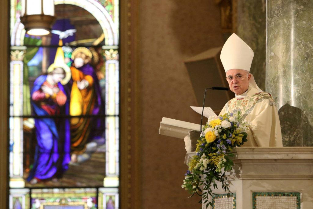 FILE PHOTO: Archbishop Carlo Maria Vigano, reads during the episcopal ordination of Auxiliary Bishops James Massa and Wito...