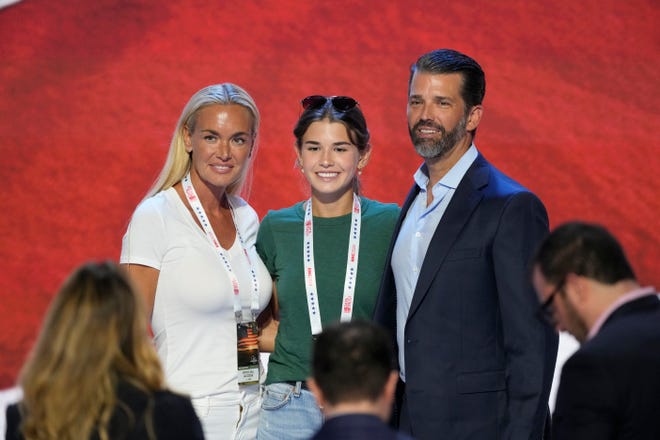 Donald Trump Jr. is seen on stage with his former wife Vanessa Trump, left, and daughter Kai Madison Trump during the third day of the Republican National Convention at Fiserv Forum. The third day of the RNC featured a feature on foreign policy and threats.