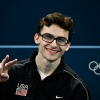 Stephen Nedoroscik throws a peace sign during the artistic gymnastics men's qualification at the Bercy Arena in Paris on Saturday.