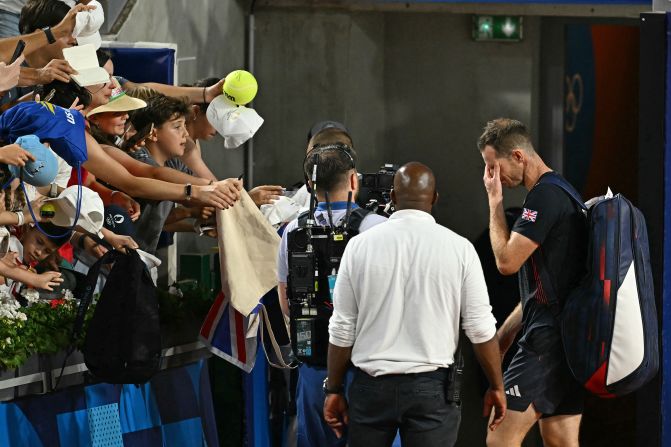 A tearful Andy Murray leaves the court after he and doubles partner Dan Evans lost in the quarterfinals on August 1. Murray, a three-time grand slam winner, is retiring from the sport.