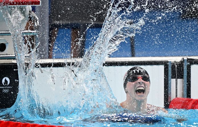 American swimmer Katie Ledecky celebrates after winning Olympic gold in the 1,500-meter freestyle on Wednesday, July 31. The American swimming legend crushed the rest of the field in her signature event, breaking her own Olympic record in the process. She finished in 15:30.02, a full 10 seconds faster than her closest competitor.