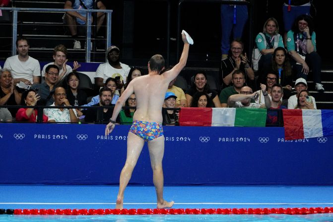 The crowd cheers for a lifeguard after he went into the pool to recover the swim cap of US swimmer Emma Weber on July 28. Lifeguards like this are common at swimming competitions, but it still provided a moment of levity in between races. NBC's commentary crew deemed him “Bob the Cap Catcher.” The lifeguard declined to release his name, a Paris 2024 spokesperson said, so that he could keep the focus on his duties.