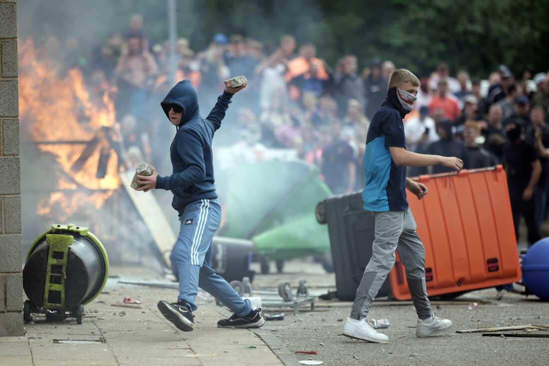 Rioters threw bricks, glass bottles and wooden planks at police officers as well as sprayed them with fire extinguishers during the riot in Rotherham, according to local police.