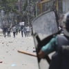 Students clash with riot police during a protest against a quota system for government jobs, in Dhaka, Bangladesh, Thursday, July 18, 2024.