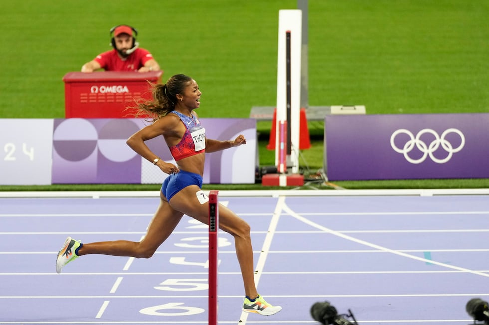 Gabrielle Thomas, of the United States, crosses the finish line in her women's 200-meters...