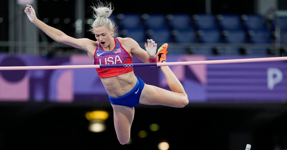 Katie Moon, of the United States, celebrates winning silver in the women's pole vault final at the 2024 Summer Olympics, Wednesday, Aug. 7, 2024, in Saint-Denis, France. (AP Photo/Rebecca Blackwell)