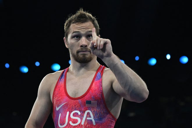 Team USA's Spencer Lee reacts to beating Uzbekistan's Gulomjon Abdullaev in their men's freestyle 57kg wrestling semifinal match during the Paris 2024 Olympic Games. Lee went 3-0 on Thursday to clinch a spot in Friday's gold medal match.