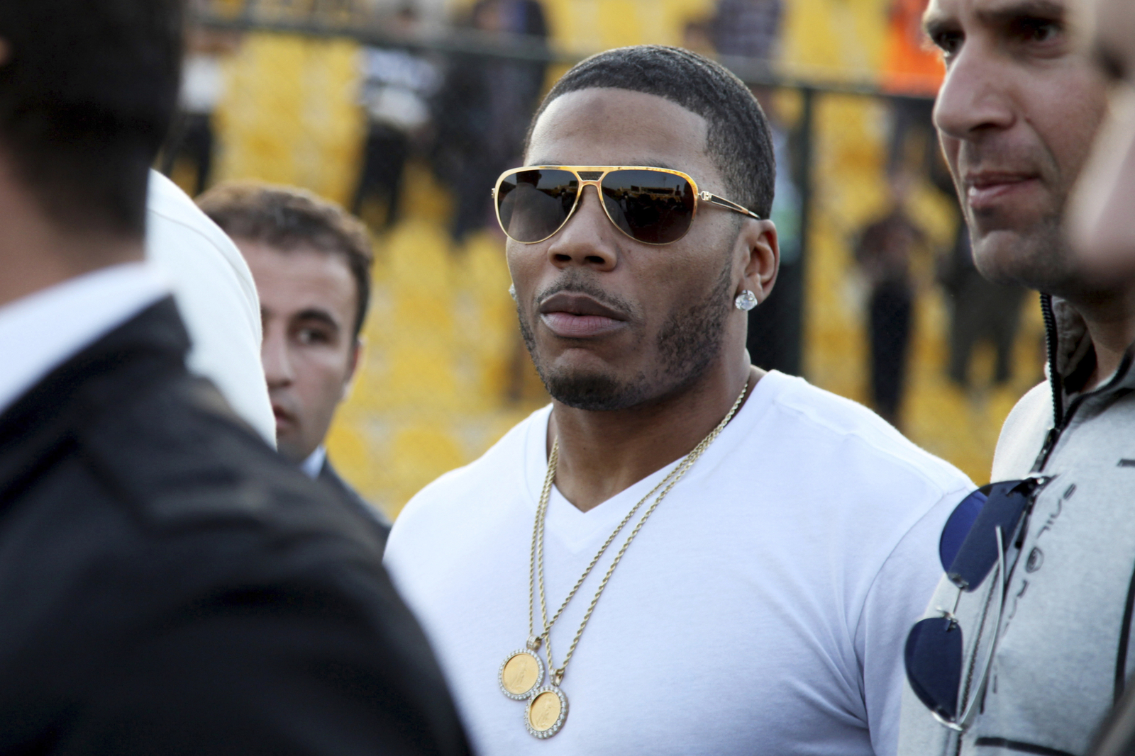 Rapper Nelly arrested in St. Louis for an alleged prior incident, not charged with drug possesion despite ecstasy pills found