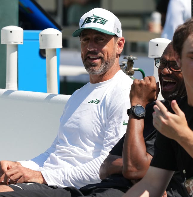 East Rutherford, NJ -- August 10, 2024 -- Aaron Rodgers on the bench during pre game warm ups as the Washington Commanders came to MetLife Stadium to play the New York Jets in the first press season game of the 2024 season.